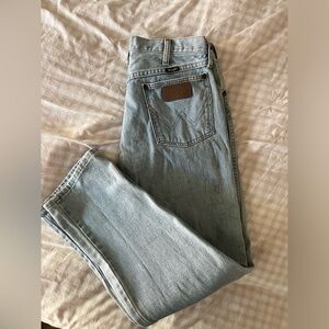 Vintage wranglers 27 inch waist, mid rise light wash